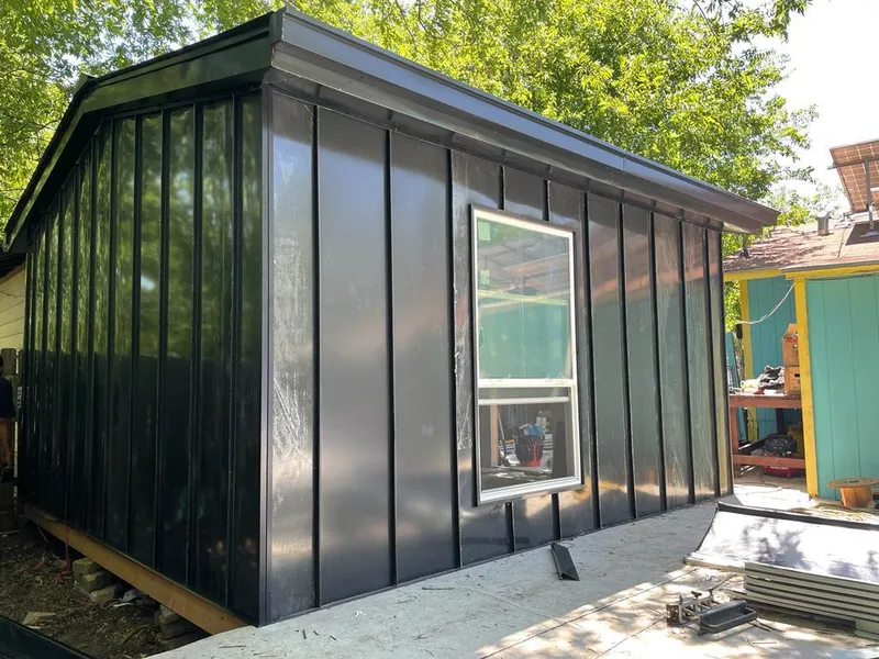 Black standing seam metal wall panels for Metal Roof Installation in Town of Pecos